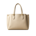 Beige handbag with gold hardware on a white background