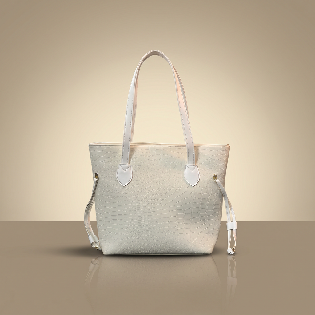 White handbag on a beige background